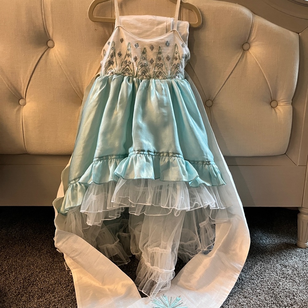 Blue and White Formal Dress with Ruffled Skirt and Lace Details